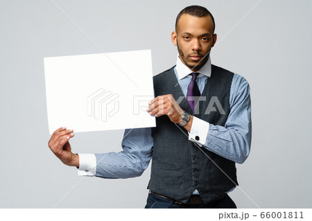professional african-american business man - presenting holding blank sign professional african-american business man - presenting holding blank sign 66001811