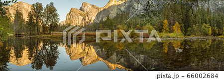 Panoramic view of the reflection of the landscape in the water of the Merced River in Yosemite National Park 66002684