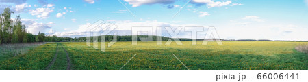 Beautiful countryside landscape. Green field and 66006441