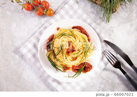 Spaghetti with agretti, a spring vegetable from Italy Spaghetti with agretti, a spring vegetable from Italy 66007021