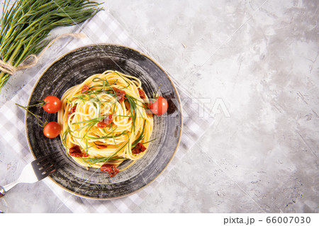 Spaghetti with agretti, a spring vegetable from Italy Spaghetti with agretti, a spring vegetable from Italy 66007030