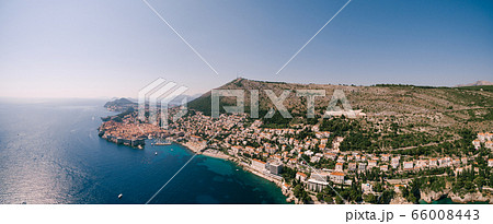 High aerial view from a drone on the coast of Dubrovnik and the old town in Croatia. High aerial view from a drone on the coast of Dubrovnik and the old town in Croatia. 66008443