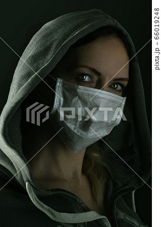 Dark photo of Young handsome man wearing medical 66019248