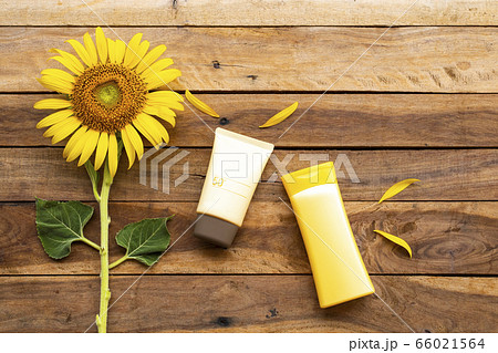 sunscreen spf50 ,body lotion cosmetics health care for skin  with yellow flowers sunflower of lifestyle woman  66021564