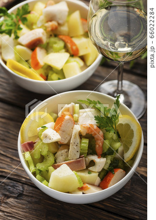 salad with seafood, potato and celery salad with seafood, potato and celery 66022284