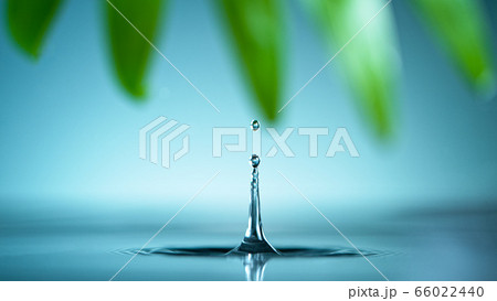 Macro shot of water drop over the water , 66022440