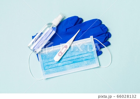 Top view of alcohol hand sanitizer, latex gloves, 66028132