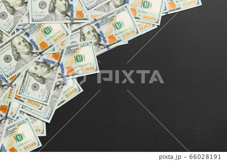 dollar bills a on a light colored background. copy 66028191