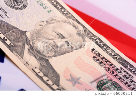 fifty dollar bill in front of the American flag 66030211