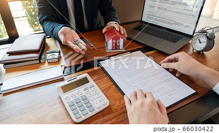 Real Estate broker or sale agent giving 66030422