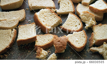Slices of sliced bread. Leftover bread 66030505