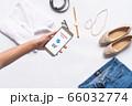 online shopping concept.close-up of hands using touch screen  66032774