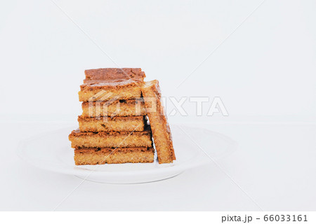 Stack of delicious freshly baked blondie brownie slices. Stack of delicious freshly baked blondie brownie slices. 66033161