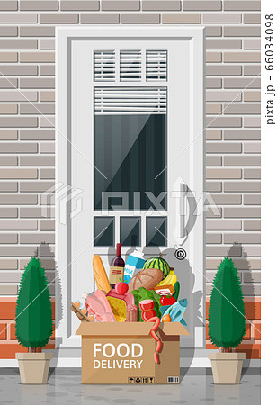 Cardboard box of groceries left at door of house 66034098
