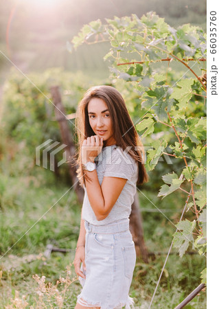 portrait of woman relaxing at countryside summer 66035760