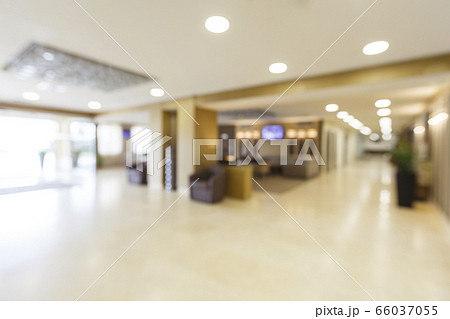 Blurred corridor and entrance of large hotel at day Blurred corridor and entrance of large hotel at day 66037055