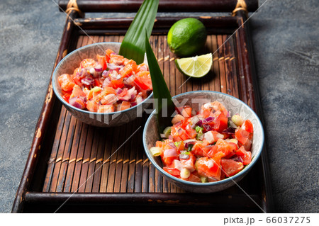 Hawaiian food Salmon Lomi Lomi. Salmon with tomatoes, onion and lemon 66037275