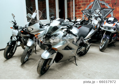 Gray sports beautiful bikes in a motor show Gray sports beautiful bikes in a motor show 66037972