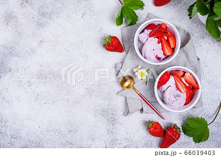 Strawberry ice cream in white bowl Strawberry ice cream in white bowl 66039403