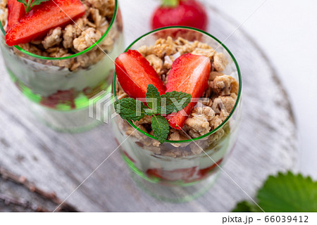 Dessert with strawberry, yogurt and granola 66039412