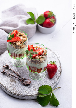 Dessert with strawberry, yogurt and granola 66039425