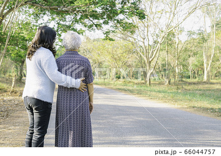 Help and care Asian senior or elderly old lady woman with strong health while walking at park Help and care Asian senior or elderly old lady woman with strong health while walking at park 66044757