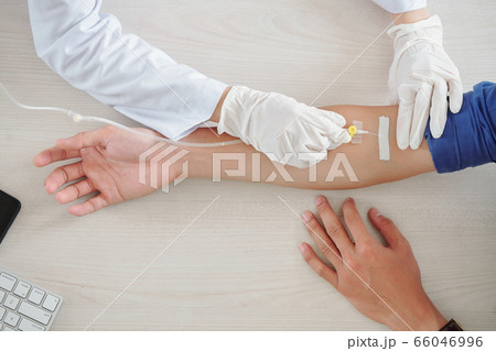 Patient getting infusion therapy 66046996