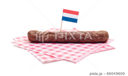 One frikadel on a napkin, a Dutch fast food snack 66049600
