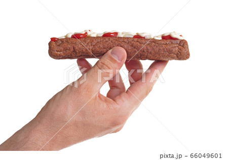 One frikadel with ketchup, mayonnaise on chopped 66049601