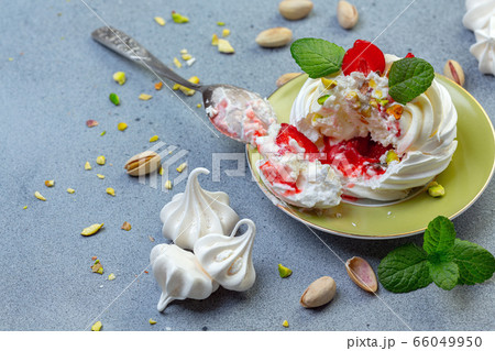 Mini Pavlova cakes with strawberry sauce, Mini Pavlova cakes with strawberry sauce, 66049950