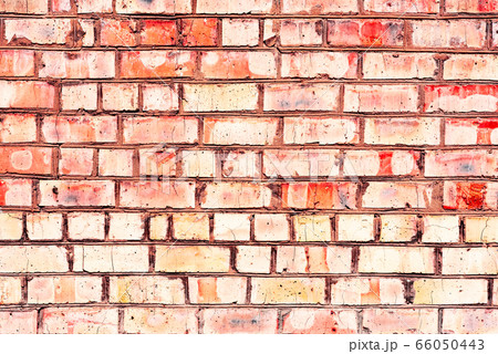 Texture of a brick wall with cracks and scratches 66050443