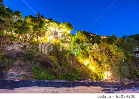 Cozy summer illuminated hotel at night 66054800