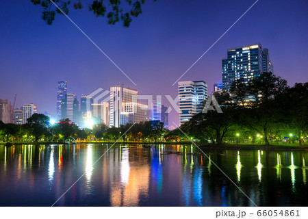 Night view of skyscrapers in Bangkok and lake in Night view of skyscrapers in Bangkok and lake in 66054861