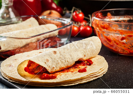 Preparation traditional mexican enchiladas with 66055031