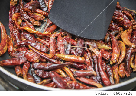 Roasted red peppers in a pan Roasted red peppers in a pan 66057326