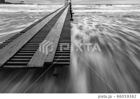 Black and white photo - surf in the storm after 66059362