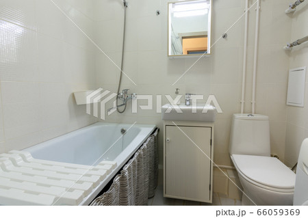 Interior of a conventional combined bath room 66059369