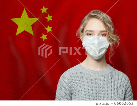 Young woman wearing a face mask with national flag Young woman wearing a face mask with national flag 66062052