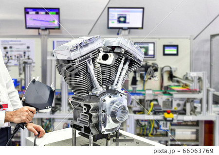 Hand-held 3D laser scanner, measuring engine accuracy In the industrial factory Hand-held 3D laser scanner, measuring engine accuracy In the industrial factory 66063769