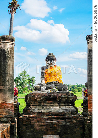 Buddha statue in old temple in Inwa (Ava) near 66066976
