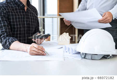 Construction engineering or architect discussing a 66072182