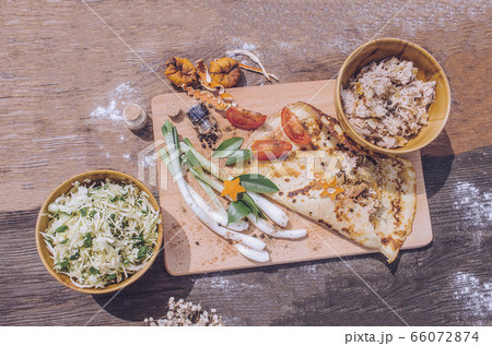 Rolls pancakes stuffed with meat. 66072874