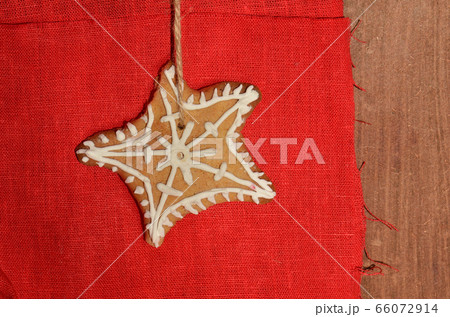 Biscuits with sugar glaze on wooden background 66072914