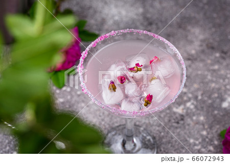 Pink cocktail Margarita with rose syrup 66072943