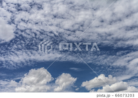 Bright summer day with cirrus and cumulus clouds Bright summer day with cirrus and cumulus clouds 66073203