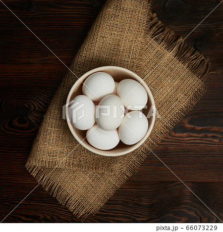 eggs in bowl on burlap rustic napkin 66073229