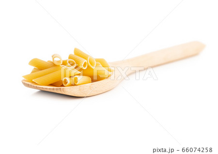 Uncooked penne pasta. Dried italian pasta in 66074258