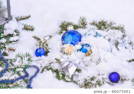 Christmas background with silver and blue baubles 66075001