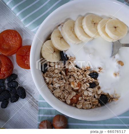 Granola with fruit and yogurt Granola with fruit and yogurt 66076517
