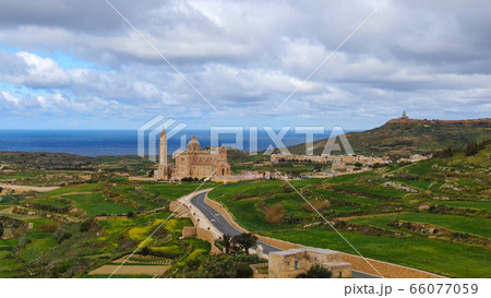 Aerial view over Basilica Ta Pinu in Gozo - a national shrine 66077059
